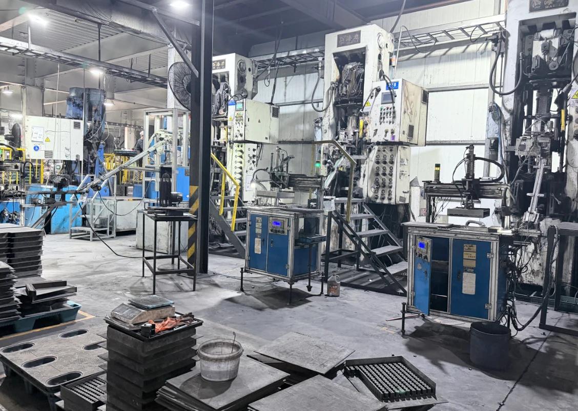 Production presses and machinery on the factory floor